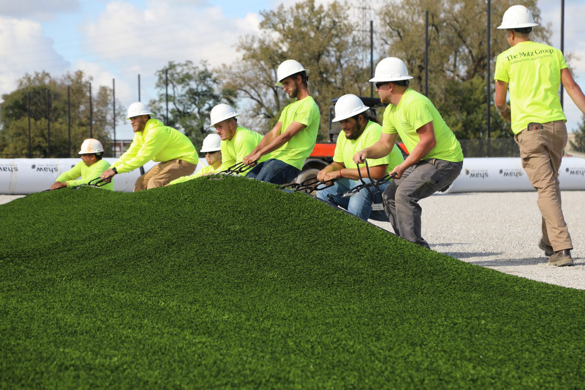 Synthetic turf pulling